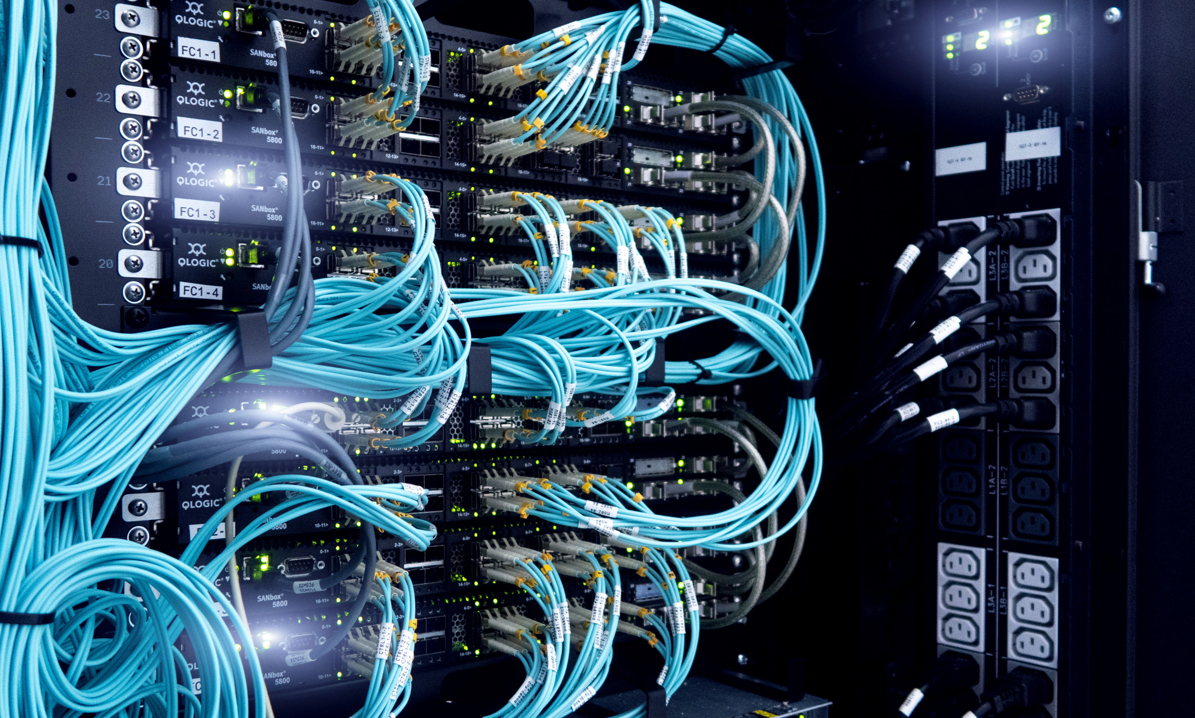 clean fiber network cabling in a data rack